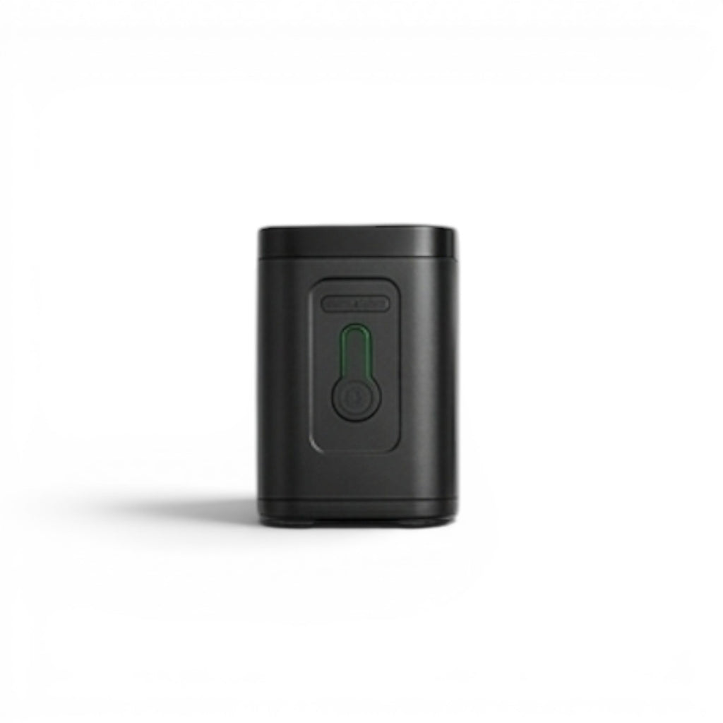 CABYN noir, petit appareil électronique avec indicateur lumineux vert et bouton de commande.