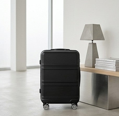 Valise cabine CABYN noire en ABS rigide, 52x38x21cm, serrure TSA, 4 roues multidirectionnelles pour un voyage facile.